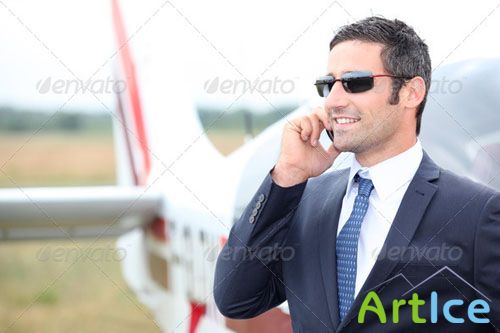Photodune - Executive standing in front of his private plane 1703217