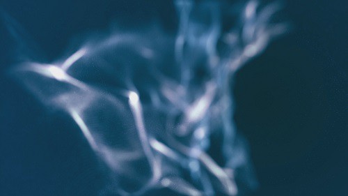 Blurred particles in the form of smoke